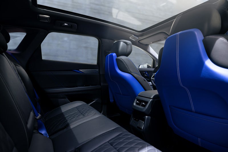 Back Seat View of the 2026 OPTIQ-V Blue Front Seats, Sun Roof, and Interior | Cabrera Hermanos in ARECIBO PR